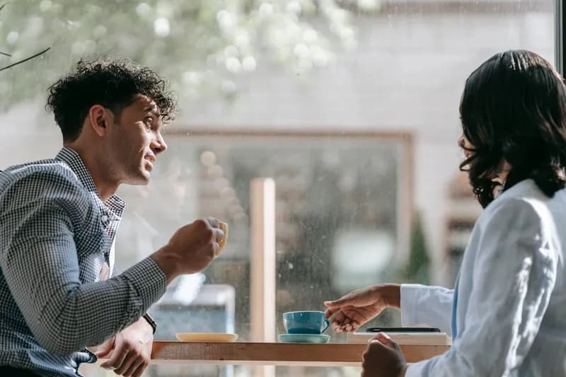 People sitting in cafe drinking coffee